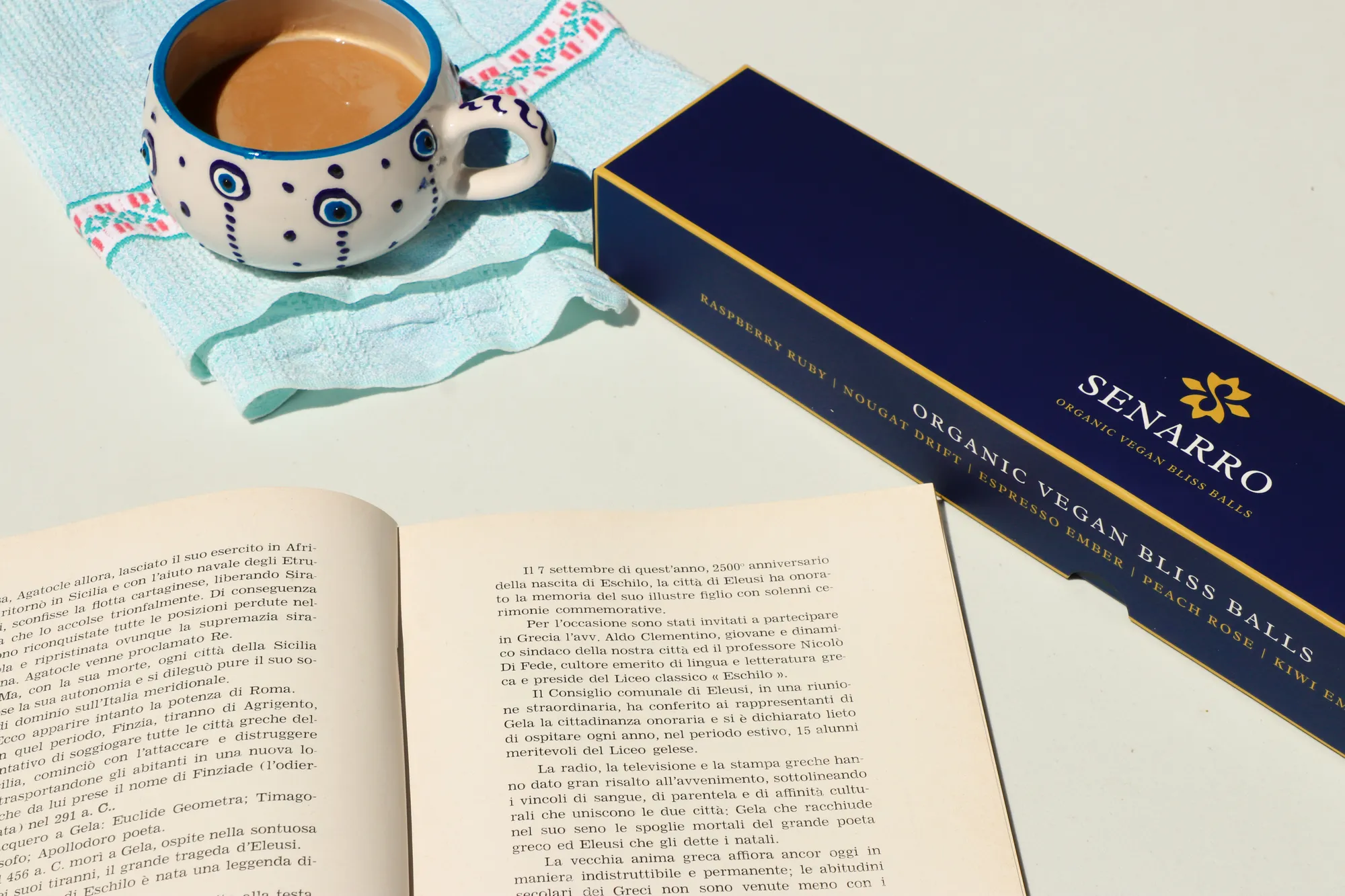 Artisanal chocolate truffles and pralines arranged on a dark surface